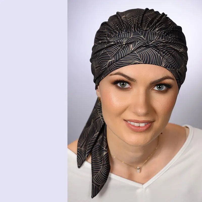 Turban chimio Amy en mousseline imprimée feuillage.